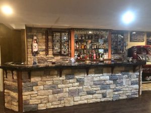 stone veneer basement bar