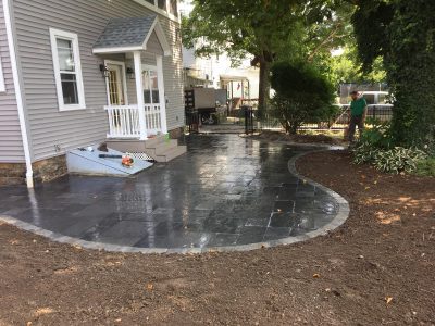 wet stone patioin backyard