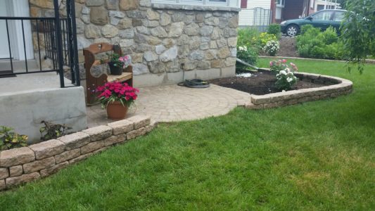 Retaining wall with landscaping Retaining wall with landscaping