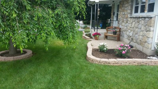 Retaining wall with landscaping Retaining wall with landscaping