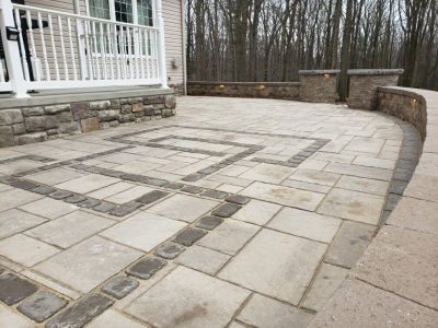 black brick custom detail squares on patio