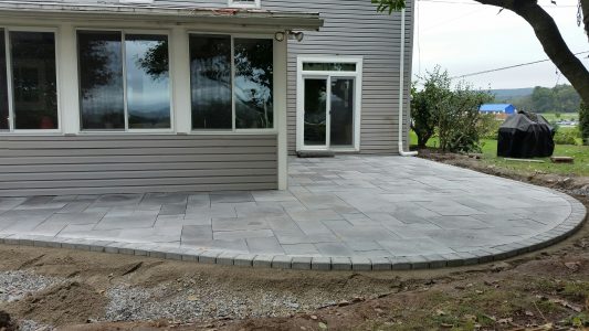 stone patio in backyard