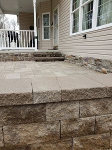 close up of stone wall around new patio