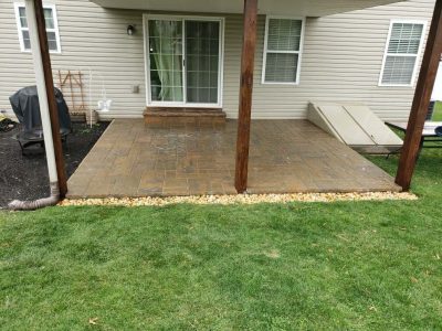 small pation of brown stone out back