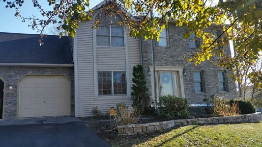 stone wall around front garden