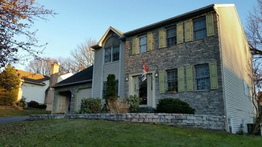 stone retaining wall around front garden