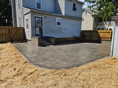 finished new patio and walkway with stair to door