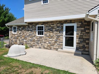 finished back patio stone veneer alt view