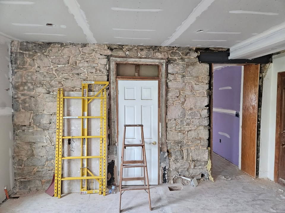 Makeover of this interior wall. Dry wall was stripped off, cleaned up the existing rocks,…